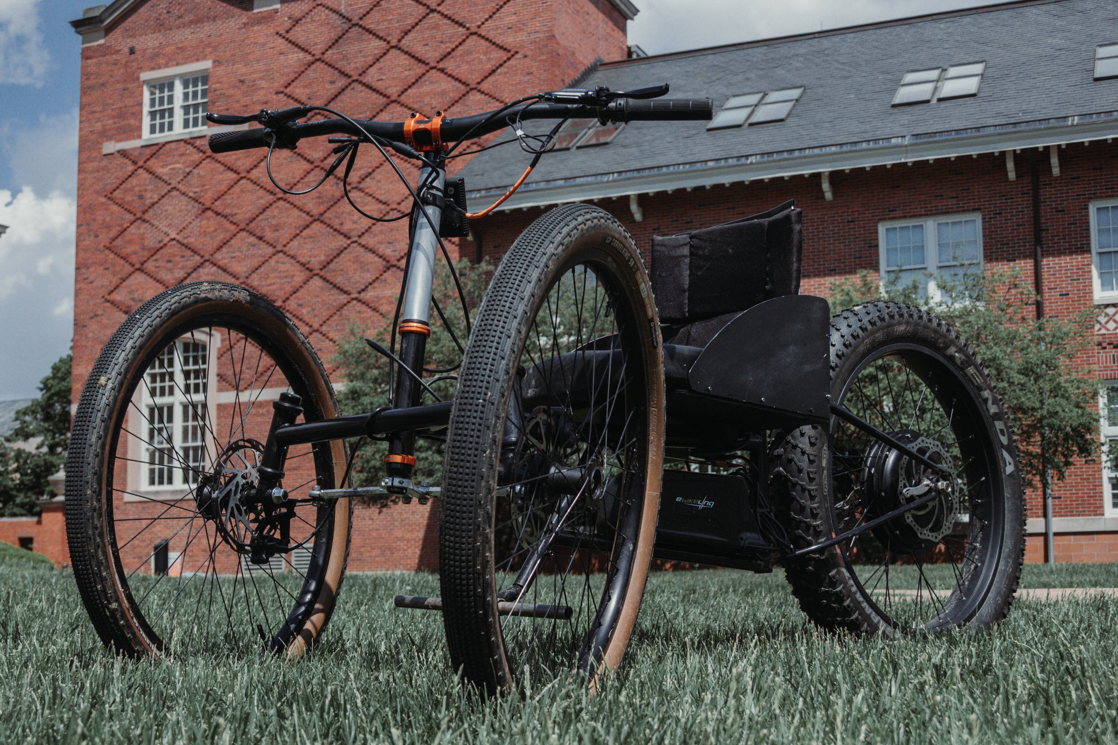 Low front three-quarter outdoor photo of the physical KOINE prototype